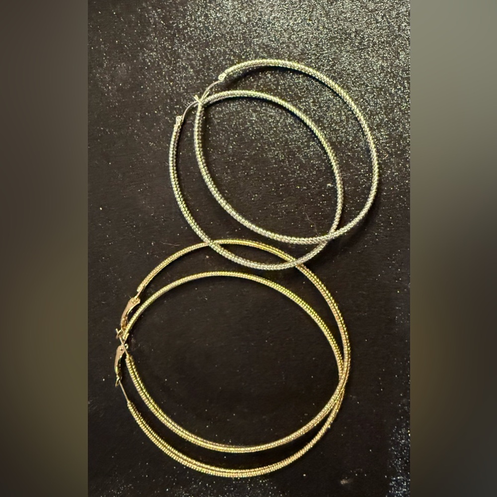 Gold & Silver fashion oval hoop earrings. Lg. 3 1/4”L x 3”W, Sm. 3”L x 2 1/4”W.